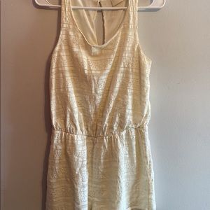 Cream lace romper, buckle open back, size medium, never worn, no tags